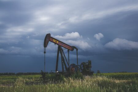 Oil Pump Amidst A Grey Sky